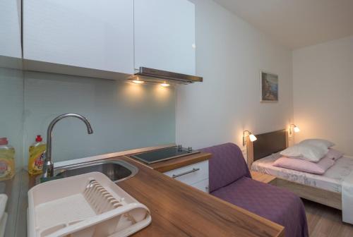 Kuchyň nebo kuchyňský kout v ubytování Villa Marija