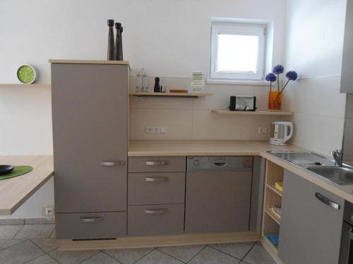 Cuisine ou kitchenette dans l'établissement Apartment Hörhager