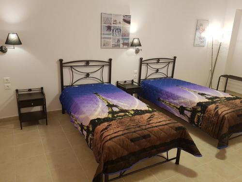 Postel nebo postele na pokoji v ubytování Alexia Ferentinou