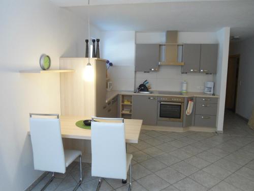 Cuisine ou kitchenette dans l'établissement Apartment Hörhager