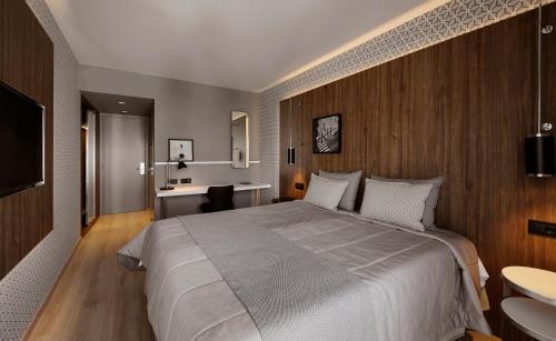 Ένα ή περισσότερα κρεβάτια σε δωμάτιο στο Evridiki