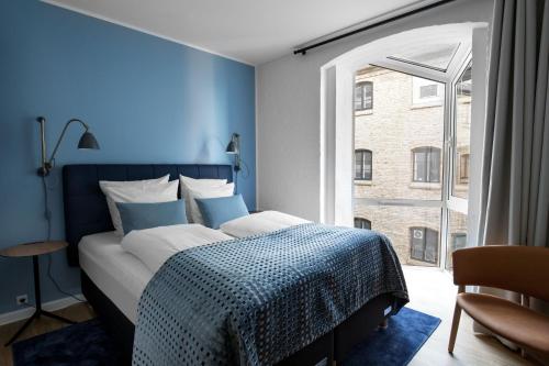 Ein Bett oder Betten in einem Zimmer der Unterkunft Copenhagen Strand