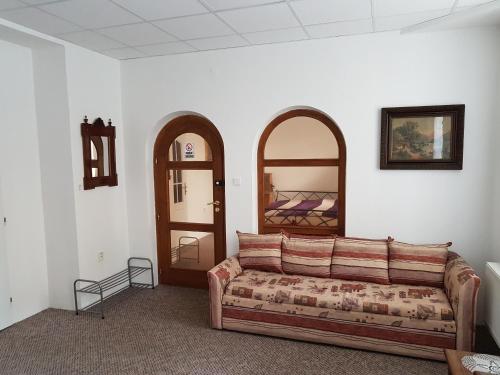 Postel nebo postele na pokoji v ubytování Apartmany u Dvora