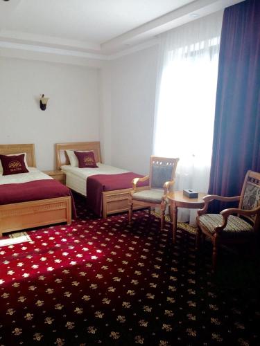 Postel nebo postele na pokoji v ubytování Nairi Hotel