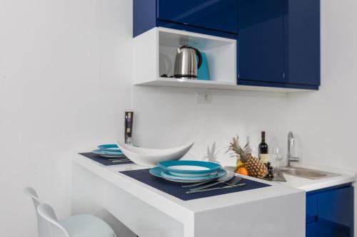Una cocina o zona de cocina en Apartments 26