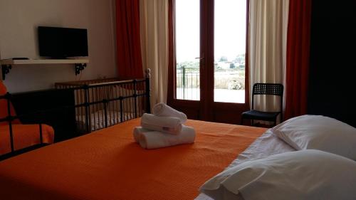 Cama o camas de una habitación en Liani Ammos