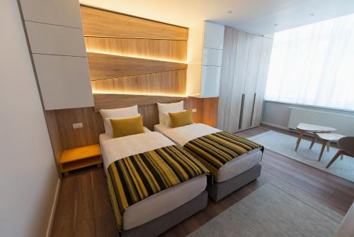 Katil atau katil-katil dalam bilik di Sarajevo Daily Apartments