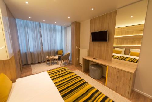 Televisyen dan/atau pusat hiburan di Sarajevo Daily Apartments