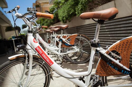 a couple of bikes parked next to some stairs at Hotel Cristallo in Rimini