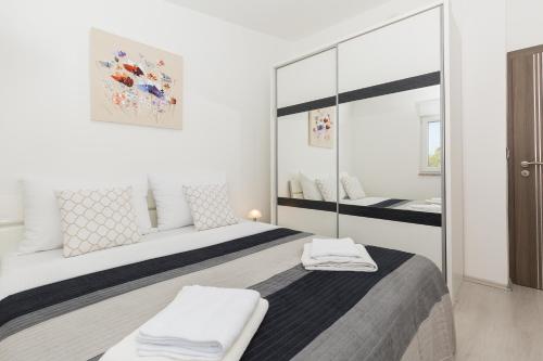 Ένα ή περισσότερα κρεβάτια σε δωμάτιο στο Modern and spacious apartment