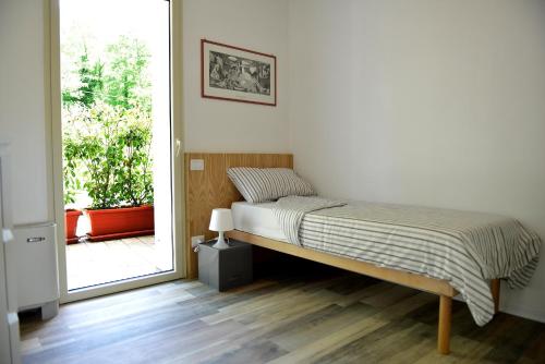 A bed or beds in a room at Il Mulin Vecchio