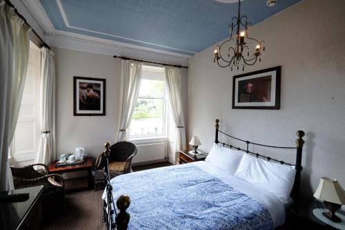 Katil atau katil-katil dalam bilik di Talisker Guest House