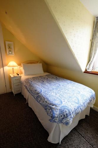 Katil atau katil-katil dalam bilik di Talisker Guest House