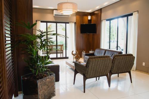 Χώρος καθιστικού στο Class Hotel Alfenas