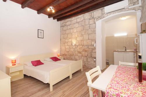 Posteľ alebo postele v izbe v ubytovaní Apartment Chupa