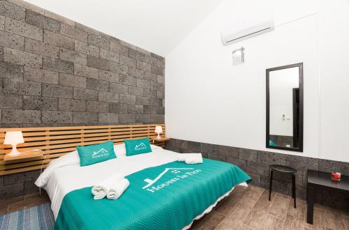 Katil atau katil-katil dalam bilik di Casa Da Poca Branca