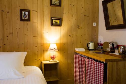 Postel nebo postele na pokoji v ubytování Laterale Residences Riquewihr