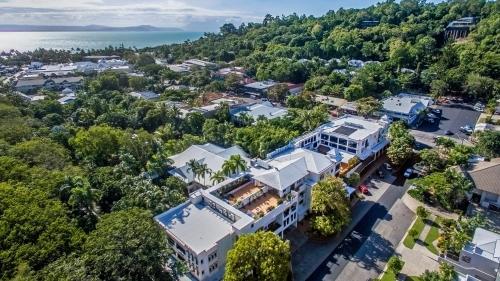 an aerial view of a large house with a pool at Regal Port Douglas in Port Douglas