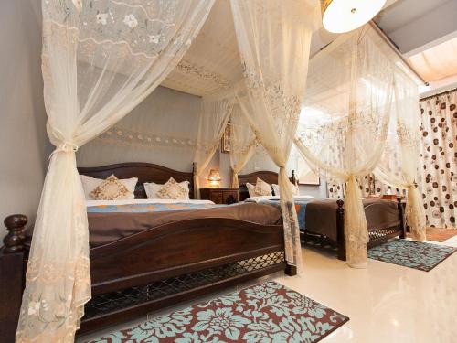 Krevet ili kreveti u jedinici u okviru objekta Kimoge Homestay