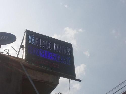 a sign that reads homestead day on top of a building at Van Long Family Homestay in Ninh Binh