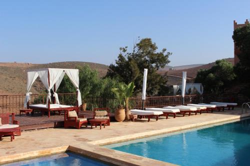 The swimming pool at or close to Hotel De Charme Les 3 Chameaux 4 étoiles