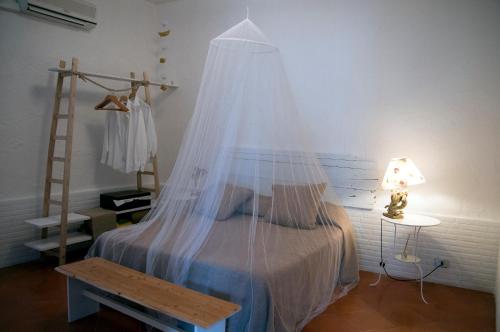 A bed or beds in a room at Addumari
