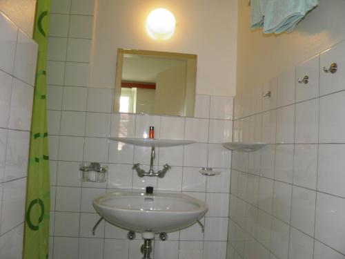 Koupelna v ubytování Auberge au Cavalier