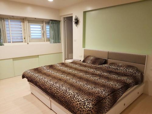 Postel nebo postele na pokoji v ubytování Lai Yi Ke B&B