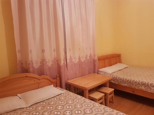 Postel nebo postele na pokoji v ubytování Vast Mongolia Tour & Hostel