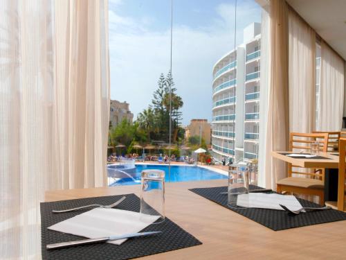 Bazén v ubytování Hotel Palia Las Palomas nebo v jeho okolí