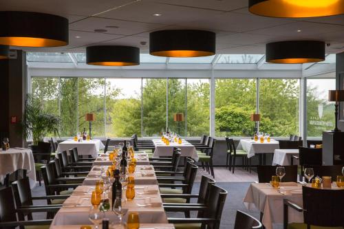 
Ein Restaurant oder anderes Speiselokal in der Unterkunft Golf & Country Hotel - Clervaux 
