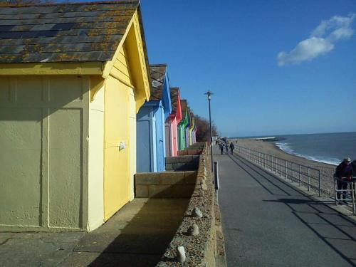 a building on the side of a beach at The Royal Norfolk Hotel in Folkestone