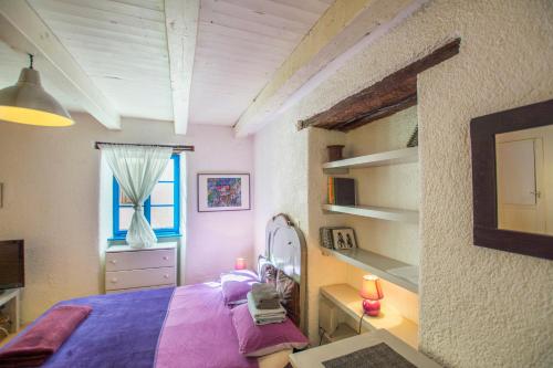 Cama ou camas em um quarto em Apartments Galerija Motovun