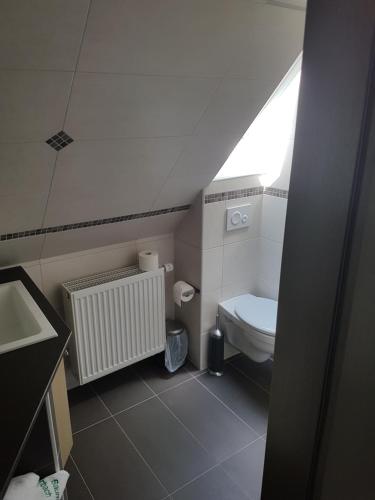 Ein Badezimmer in der Unterkunft Zum grünen Baum Hotel Frankfurt Airport