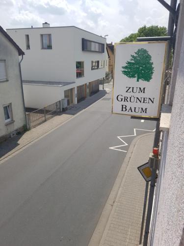 Ein Zertifikat, Auszeichnung, Logo oder anderes Dokument, das in der Unterkunft Zum grünen Baum Hotel Frankfurt Airport ausgestellt ist