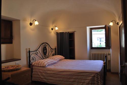 Ένα ή περισσότερα κρεβάτια σε δωμάτιο στο Stone House Ilovemajella