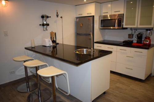 Kuchyň nebo kuchyňský kout v ubytování Blue Reef