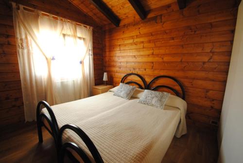 Säng eller sängar i ett rum på Villa Primavera