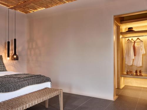 En eller flere senger på et rom på Incognito Beach Villa Santorini
