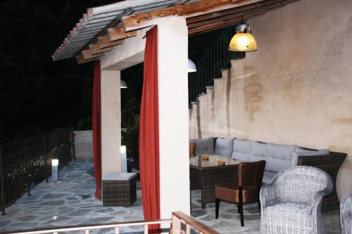 Ein Sitzbereich in der Unterkunft Casa Di Lucia Mi-Hotel