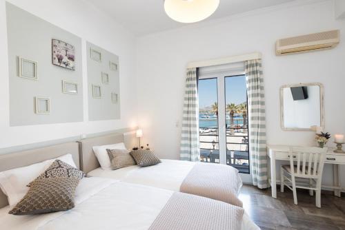 Posteľ alebo postele v izbe v ubytovaní Hotel Oasis