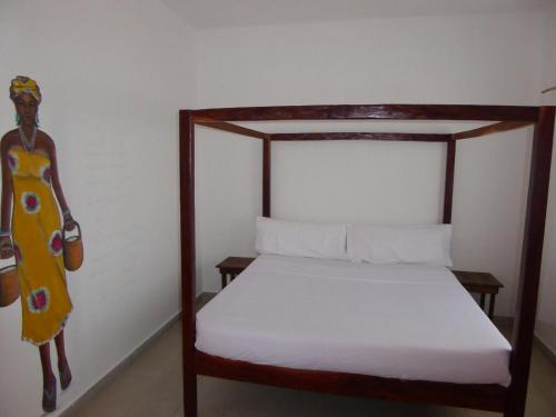Cama o camas de una habitación en Sarawally Guesthouse