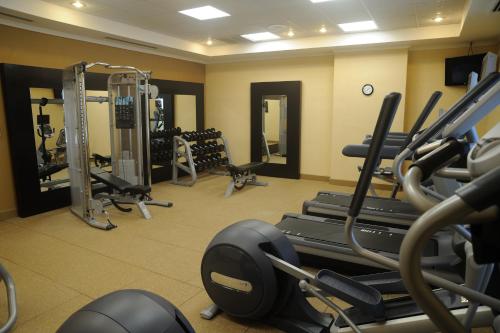 a gym with cardio equipment in a hotel room at Hilton Garden Inn Panama City Downtown, Panama in Panama City