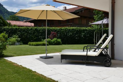 Κήπος έξω από το Bodenschneid Suiten Rottach-Egern