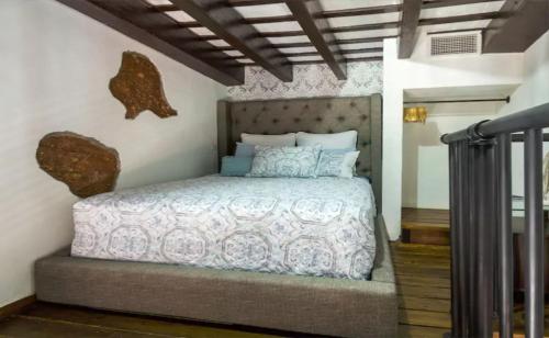 A bed or beds in a room at 315 Recinto Sur Old San Juan