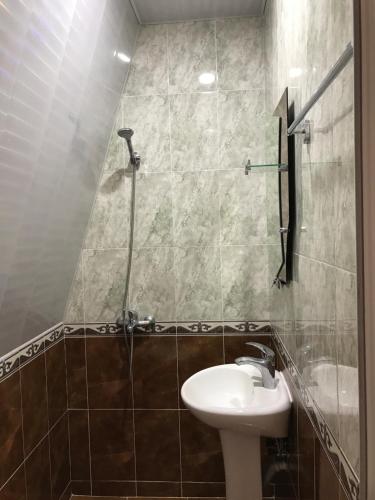 Kúpeľňa v ubytovaní Kvariati - Guest House