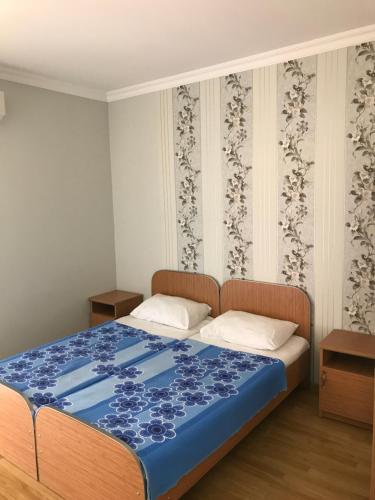 Posteľ alebo postele v izbe v ubytovaní Kvariati - Guest House