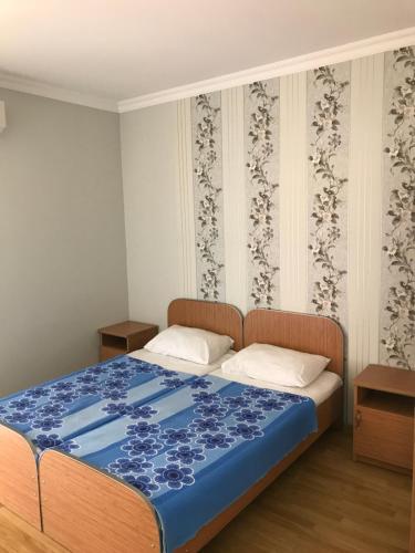 Llit o llits en una habitació de Kvariati - Guest House