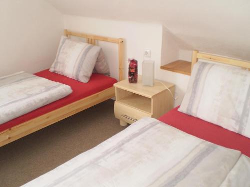 Cama o camas de una habitación en Apartment Za Poštou