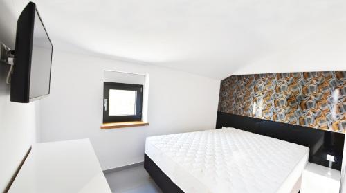 Postel nebo postele na pokoji v ubytování House Art